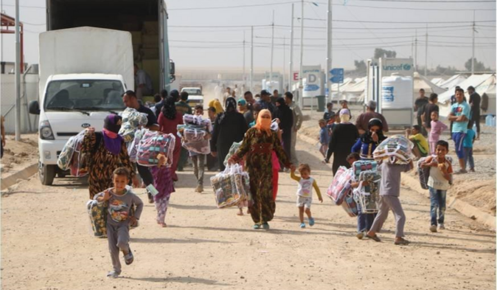 people getting aid from lorry